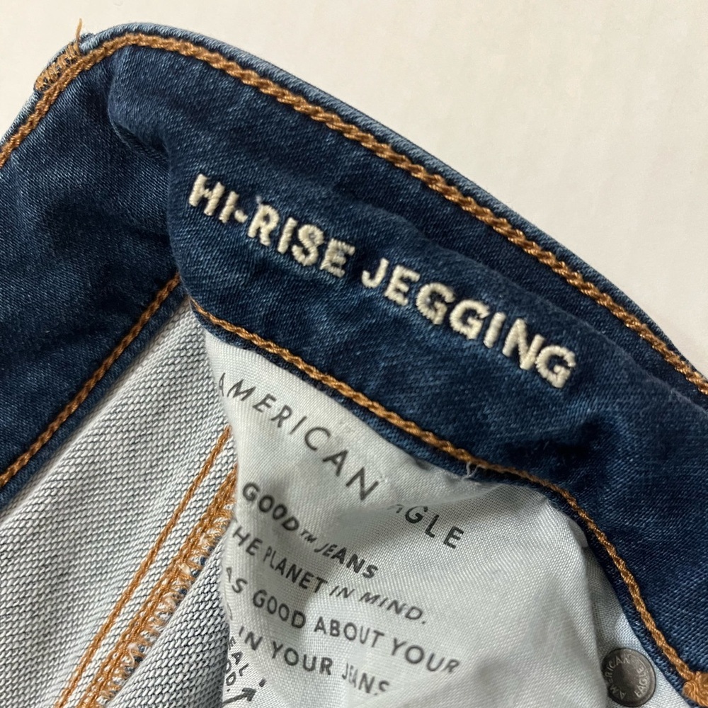 American Eagle Outfitters | Women's Distressed Hi-Rise Soft Knit Skinny Jeans - Picture 6 of 7